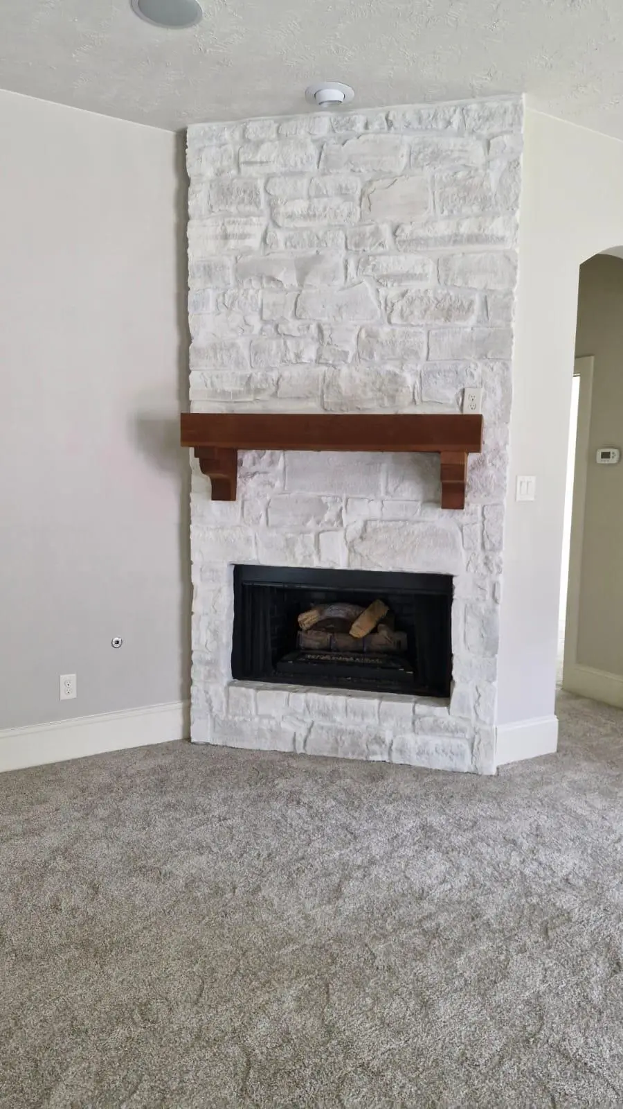 Fireplace repainted by HAB Remodeling & Construction